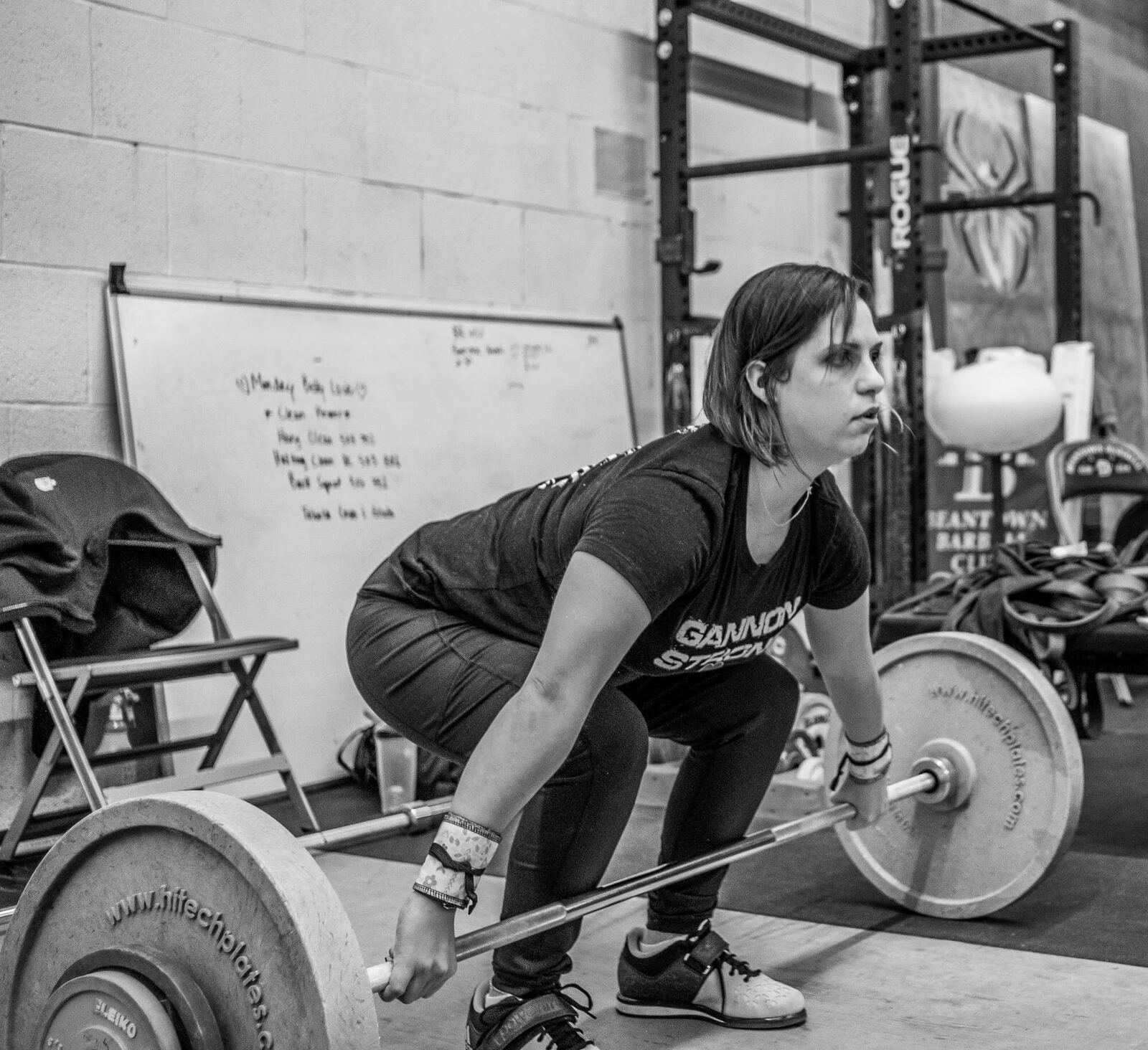 Athlete performing a snatch during a beginner training session